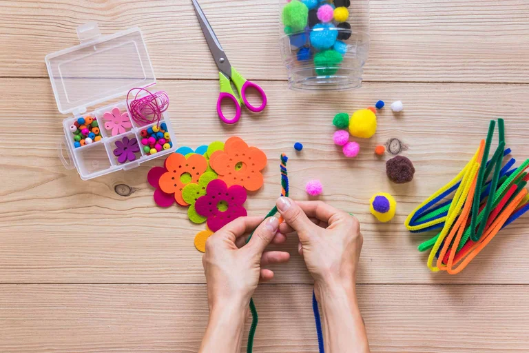 Manualidades (crafts) activity with students creating art